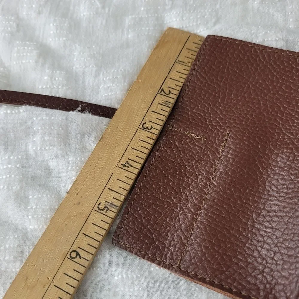 Mark & Graham brown pebbled leather charger rollup pockets tie closure minimal